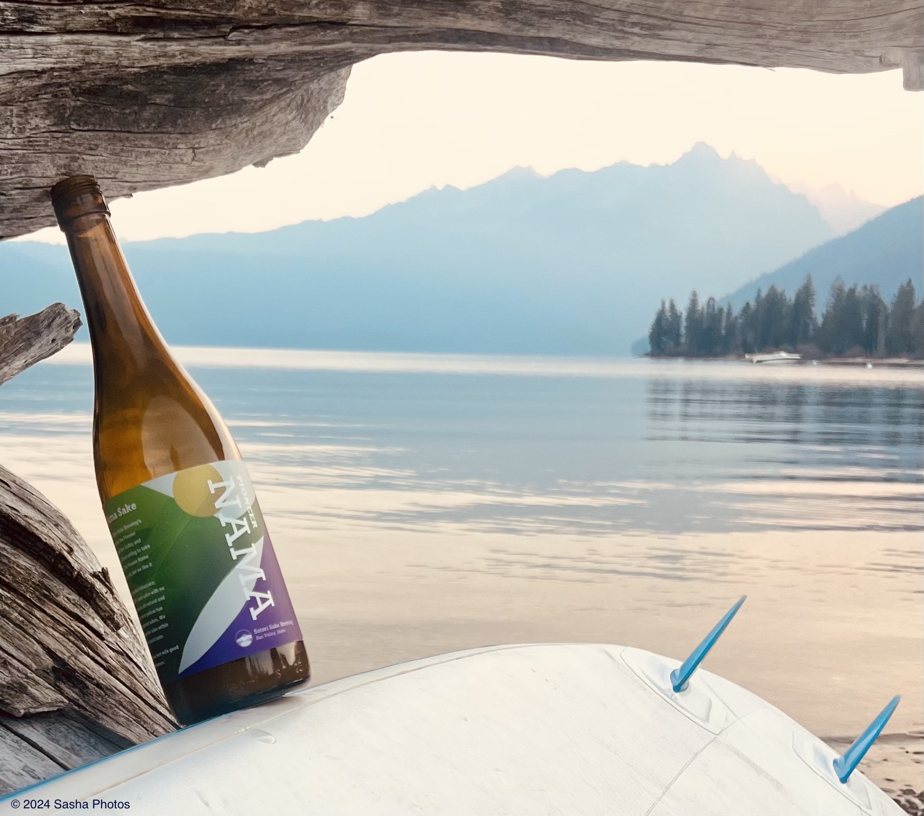 Image of sake bottle against a lake background